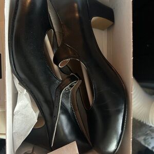 Elegant Black Heels with Polished Leather Finish